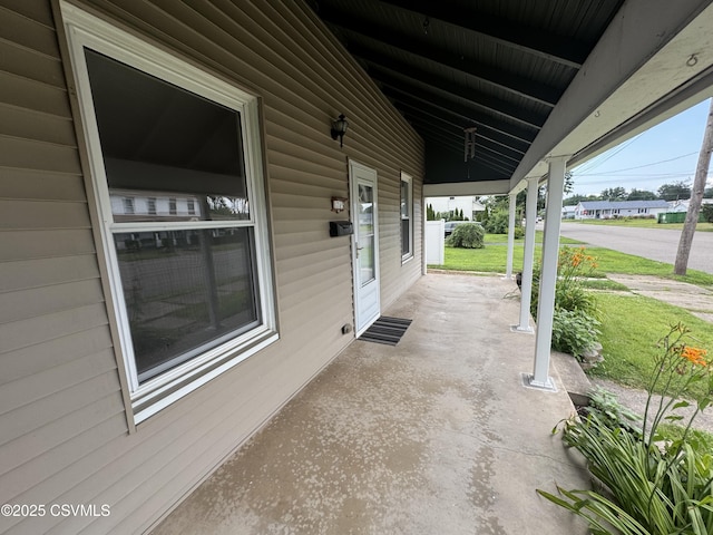 1715 Spring Garden Ave, Berwick, PA 18603 - covered porch featuring a lawn