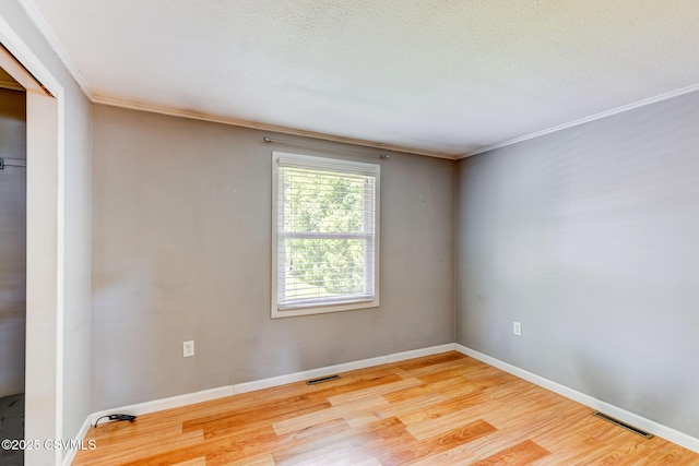 745 Liberty St, Danville, PA 17821 - unfurnished room with light wood-type flooring and ornamental molding