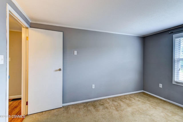 745 Liberty St, Danville, PA 17821 - spare room featuring ornamental molding and carpet flooring