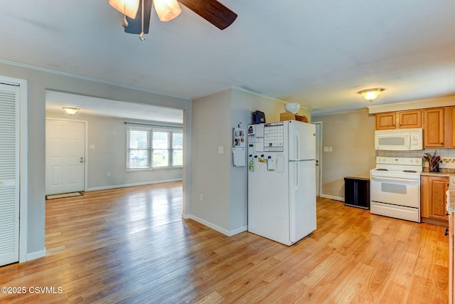 745 Liberty St, Danville, PA 17821 - kitchen with white appliances, ornamental molding, a ceiling fan, light wood-style floors, and backsplash