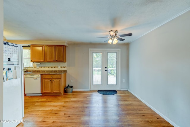 745 Liberty St, Danville, PA 17821 - kitchen with white dishwasher, a ceiling fan, healthy amount of natural light, french doors, and ornamental molding