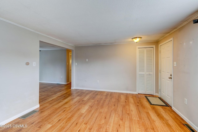 745 Liberty St, Danville, PA 17821 - spare room with light wood finished floors and crown molding