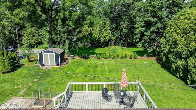 745 Liberty St, Danville, PA 17821 - view of grassy yard featuring a storage unit and a deck
