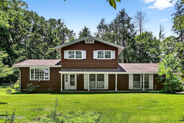 725 Avenue Ave E, Danville, PA 17821 - split level home with a front yard, roof with shingles, and a porch