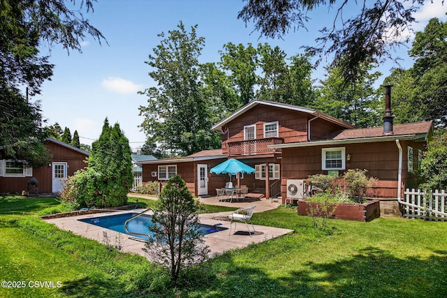 725 Avenue Ave E, Danville, PA 17821 - rear view of property with a patio area, an outdoor pool, and a balcony