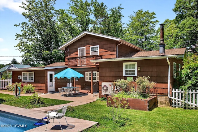 725 Avenue Ave E, Danville, PA 17821 - rear view of house featuring a patio area and a shingled roof