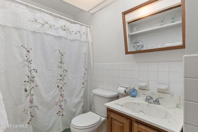 725 Avenue Ave E, Danville, PA 17821 - full bathroom featuring tile walls, vanity, a wainscoted wall, and curtained shower