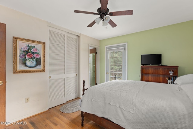 725 Avenue Ave E, Danville, PA 17821 - bedroom with wood finished floors, a closet, ceiling fan, and access to outside