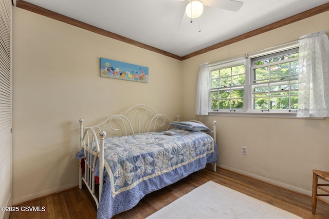725 Avenue Ave E, Danville, PA 17821 - bedroom featuring wood finished floors, crown molding, and a ceiling fan