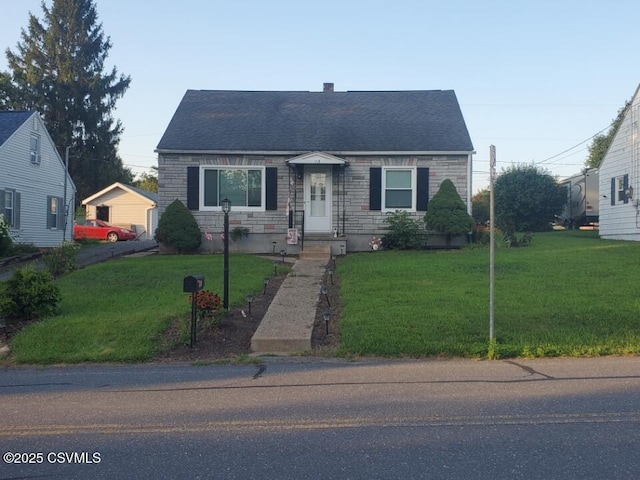 118 W 11th Ave, Shamokin Dam, PA 17876 - cape cod house with a front lawn and roof with shingles