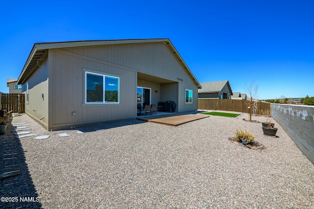 11512 Cepheus Rd, Bellemont, AZ 86015 - back of property with a patio area and a fenced backyard