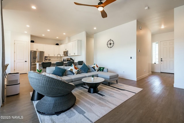 11512 Cepheus Rd, Bellemont, AZ 86015 - living area with wood finished floors, a ceiling fan, baseboards, and recessed lighting