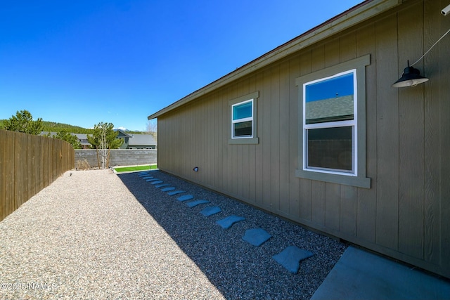 11512 Cepheus Rd, Bellemont, AZ 86015 - view of side of home with fence