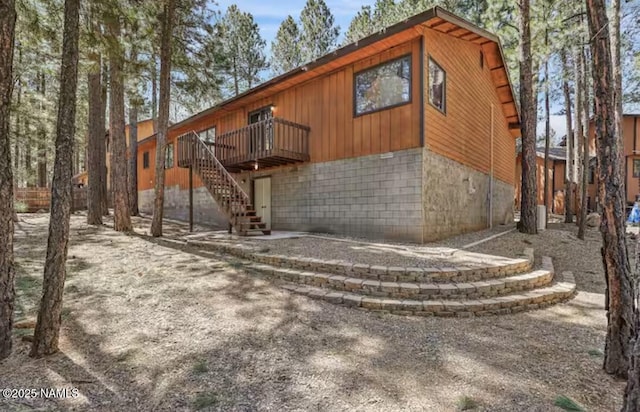 3120 W Tami Ln, Flagstaff, AZ 86001 - view of side of home with stairs and a deck