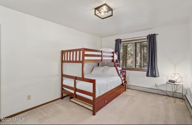 3120 W Tami Ln, Flagstaff, AZ 86001 - carpeted bedroom with baseboards and baseboard heating