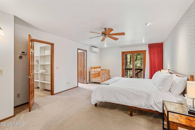3120 W Tami Ln, Flagstaff, AZ 86001 - bedroom featuring a wall mounted AC, access to outside, baseboards, carpet, and ceiling fan