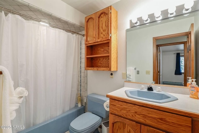 3120 W Tami Ln, Flagstaff, AZ 86001 - full bathroom featuring vanity, shower / bath combo, and toilet
