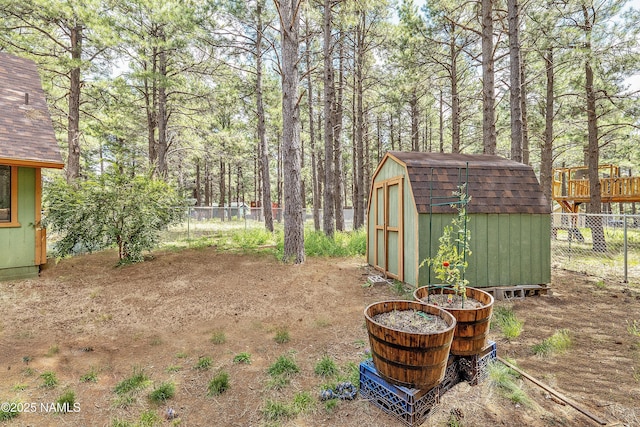 13148 E King John Rd, Parks, AZ 86018 - fenced backyard featuring a shed and an outbuilding