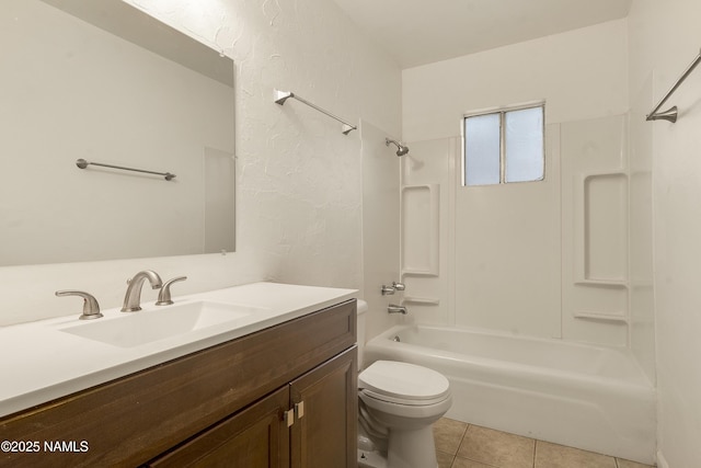 full bathroom with vanity, toilet, shower / bathing tub combination, and tile patterned flooring