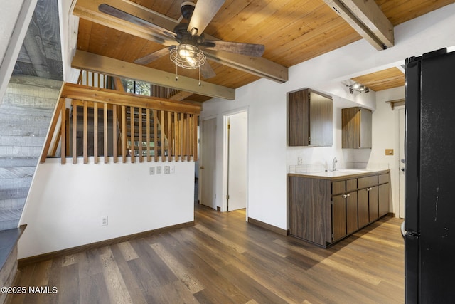 937 Osage, Flagstaff, AZ 86005 - kitchen with wood ceiling, freestanding refrigerator, beam ceiling, baseboards, and a ceiling fan