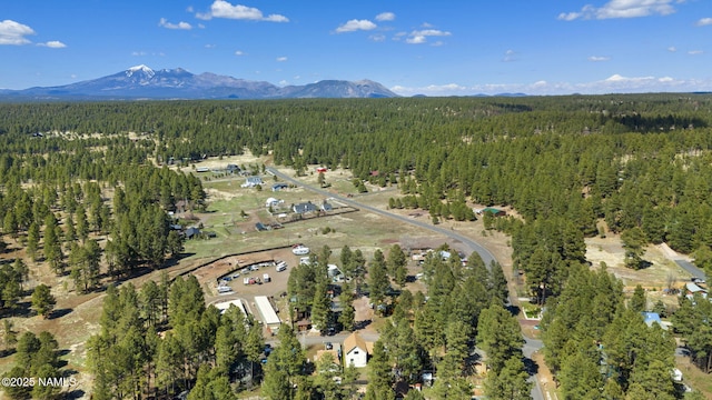 937 Osage, Flagstaff, AZ 86005 - view of property location with a heavily wooded area and mountains