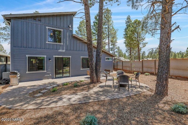 rear view of house featuring a patio area