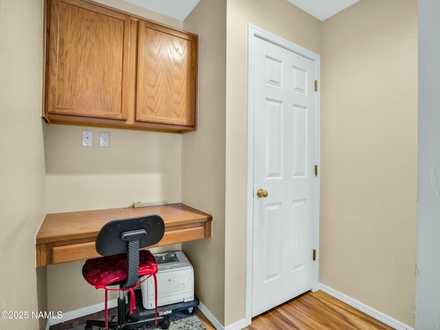 office space featuring light wood-type flooring