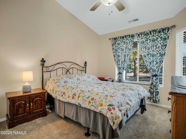 carpeted bedroom with ceiling fan and lofted ceiling