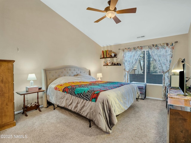 bedroom featuring light colored carpet, ceiling fan, and vaulted ceiling