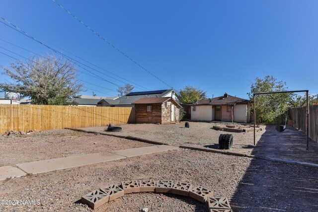 exterior space with a storage shed