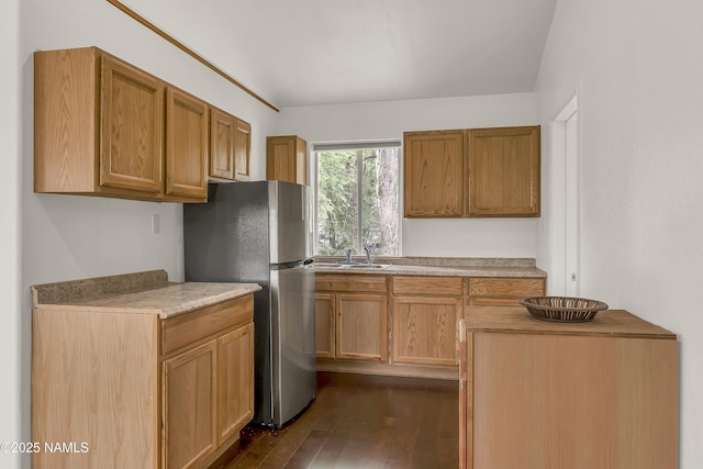 3494 N Andes Dr, Flagstaff, AZ 86004 - kitchen featuring freestanding refrigerator, dark wood finished floors, a sink, and light countertops