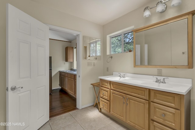 3494 N Andes Dr, Flagstaff, AZ 86004 - full bath featuring double vanity, tile patterned floors, and baseboards