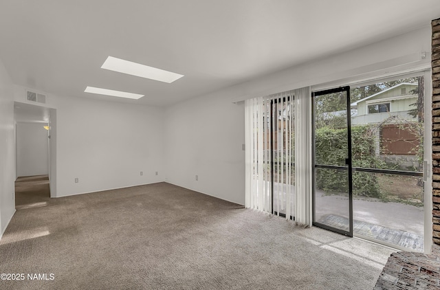 3494 N Andes Dr, Flagstaff, AZ 86004 - carpeted spare room featuring a skylight