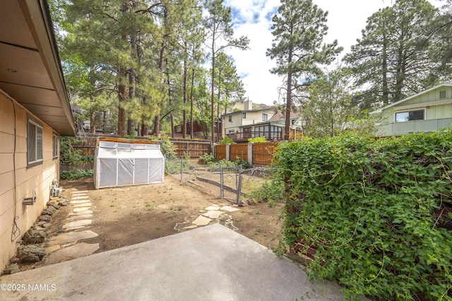 3494 N Andes Dr, Flagstaff, AZ 86004 - view of yard featuring a vegetable garden and a patio area