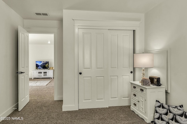 417 W Wulfenite Rd, Flagstaff, AZ 86005 - unfurnished bedroom with baseboards, visible vents, a closet, and carpet flooring