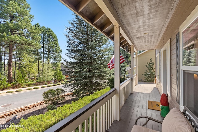 balcony featuring a porch