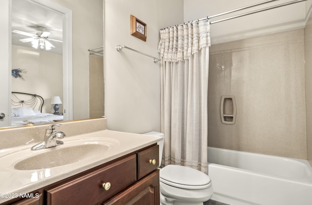 full bathroom with toilet, shower / tub combo with curtain, ceiling fan, and vanity