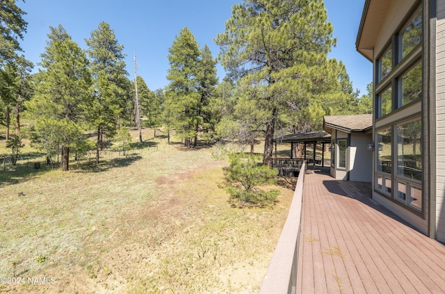 view of yard featuring a gazebo and a wooden deck