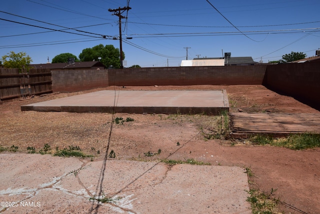 644 W Hillview St, Winslow, AZ 86047 - fenced backyard featuring a patio area