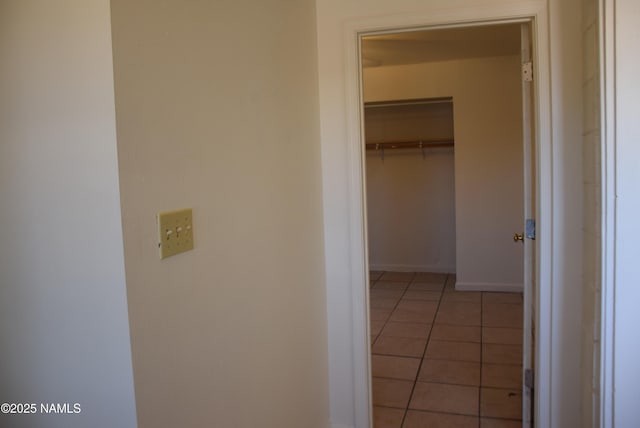 644 W Hillview St, Winslow, AZ 86047 - hallway with light tile patterned flooring and baseboards