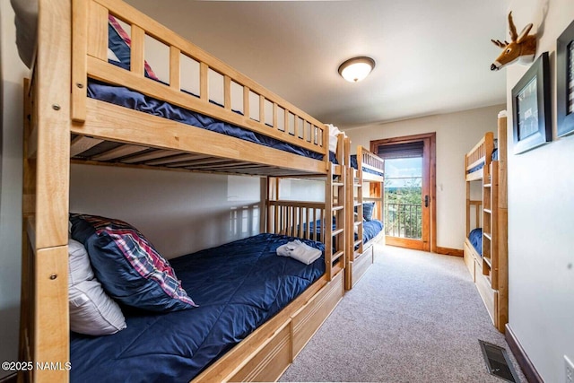 9178 N Snowbowl Ranch Rd, Flagstaff, AZ 86001 - carpeted bedroom with access to exterior