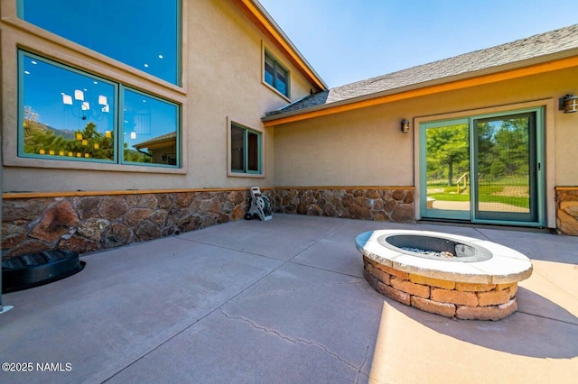 9178 N Snowbowl Ranch Rd, Flagstaff, AZ 86001 - view of patio / terrace with a fire pit