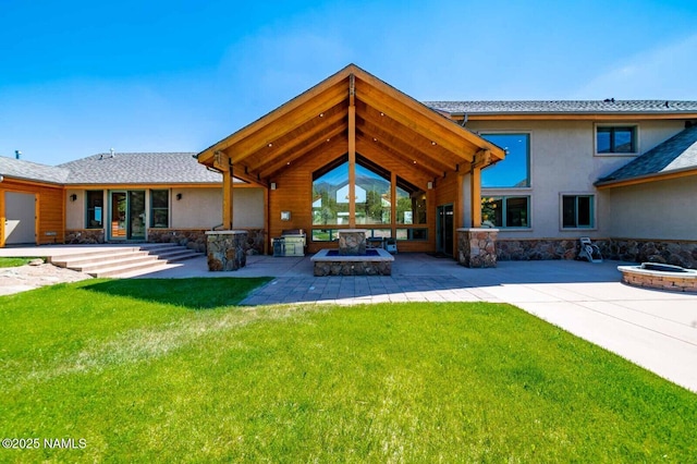 9178 N Snowbowl Ranch Rd, Flagstaff, AZ 86001 - back of property with an outdoor fire pit, stone siding, a patio area, a yard, and stucco siding