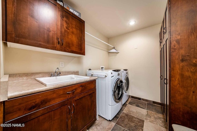 9178 N Snowbowl Ranch Rd, Flagstaff, AZ 86001 - washroom featuring cabinet space, separate washer and dryer, and stone finish floors