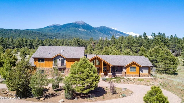 9178 N Snowbowl Ranch Rd, Flagstaff, AZ 86001 - view of mountain backdrop featuring a heavily wooded area