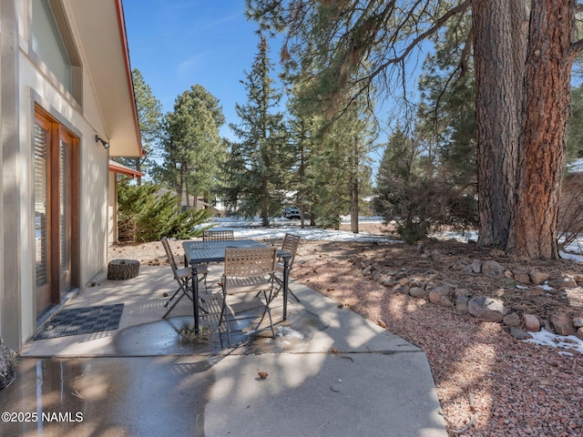 view of patio with outdoor dining area