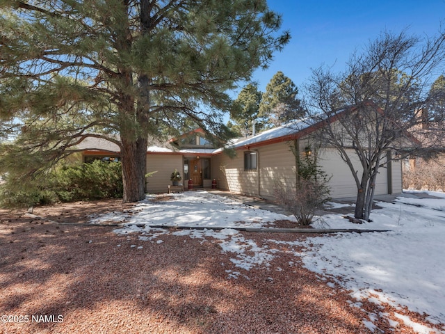 exterior space with an attached garage and driveway