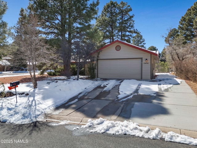 exterior space featuring a detached garage