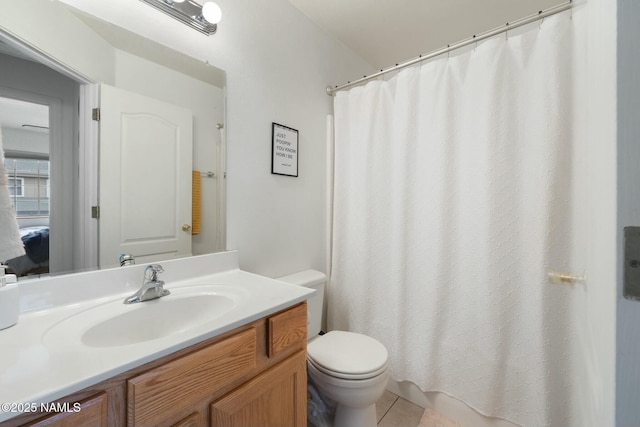2548 S Gravel Ln, Flagstaff, AZ 86001 - full bath with toilet, vanity, tile patterned flooring, and a shower with curtain