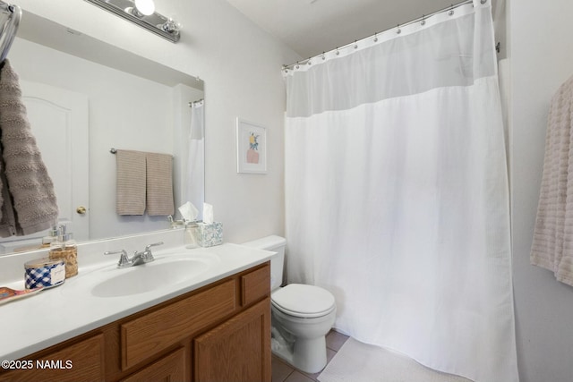 2548 S Gravel Ln, Flagstaff, AZ 86001 - full bathroom featuring tile patterned flooring, vanity, and toilet